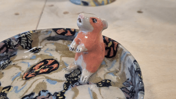 gif of a ceramic guinea pig sculpture melting